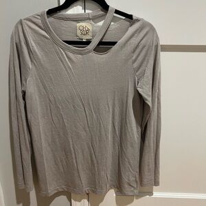 Chaser long sleeve grey/taupe cut out top. Small whole in sleeve